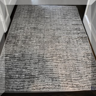 D08. Nu Loom Gray and white striated rug. 71”l x 48”w - $36
